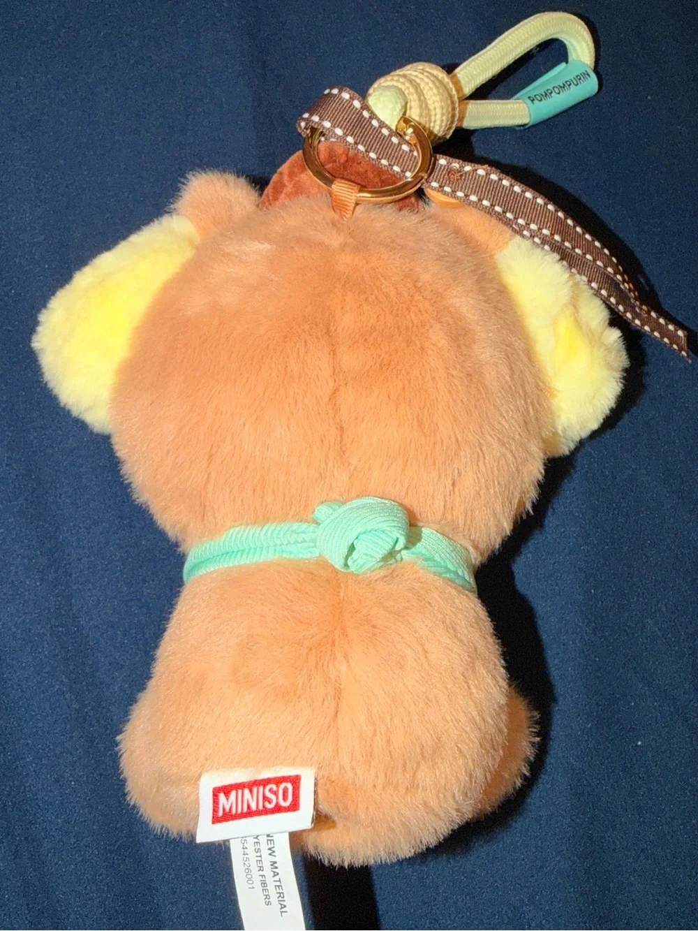 MINISO - Capybara Pompompurin Plush Keychain